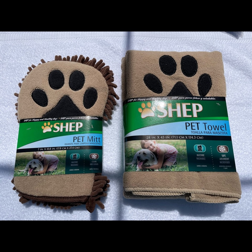 New in package. Shep pet mitt and Shep pet towel.